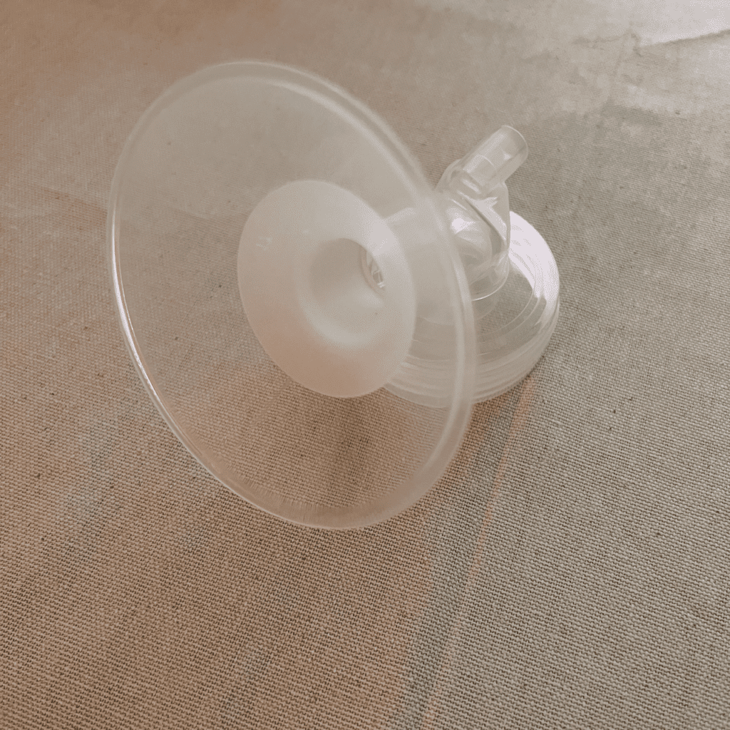 how should a breast pump flange fit